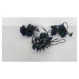 Three strands of blue Christmas string lights, a