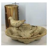Cast iron bird bath decor piece and a stoneware