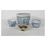 Three Asian style planter bowls and a stamped
