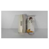 Jackie Kennedy porcelain doll with stand,