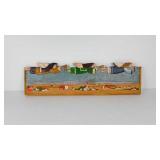 Carved wooden wall plaque by Al Pisano, signed,