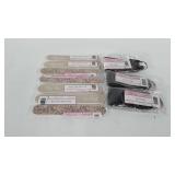 Thirty-one nail files and key fobs