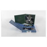 Three boxes of Longaberger pewter ornaments,