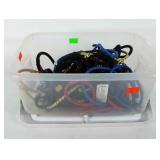 Small storage tote full of bungee cords
