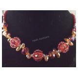 Red and champagne color beaded glass necklace