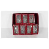 Seven snowmen ornaments, each in box