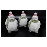 Painted terracotta snowmen penguins, three, stand