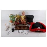 2 baby dolls, 2 hats, train (not tested), etc.