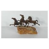 Bronze horse sculpture on stone, 10x10