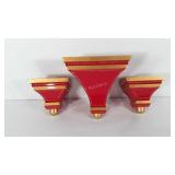 Three matching wall shelves