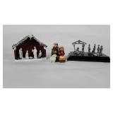 Three mini nativity scenes, metal and wood are