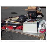 Skid with golf clubs, baseball softball bats,