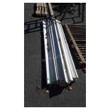 12 Trim Boards, primed, I believe used as Door