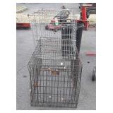 Two well used wire cages