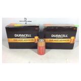 Two full boxes of Duracell D12 batteries, expires