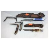 Five knives, two with cases and three pocket