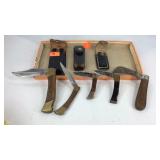 Five pocket knives with three cases, one is