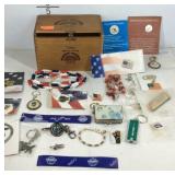 Cigar box with keychains and some costume jewelry