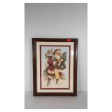 Framed Santa Claus print with glitter accents,