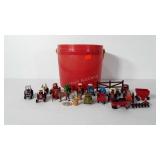 Bucket of toys, includes mostly tractors and farm