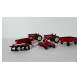 Toys, die cast metal tractors, plows, and wagons,