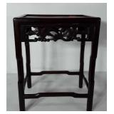 Wooden console table with carved leaf accents, 17"