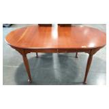 Walter of Wabash cherry wood table with two