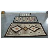 Three Native American inspired scatter rugs, the