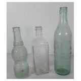 3 glass bottles: Undertaker Supply Company,