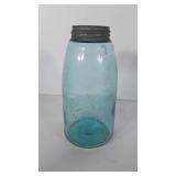 Blue Ball mason canning jar with zinc lid, half