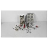 Kitchenwares, cookie cutters, can opener, cheese