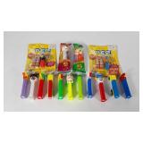 Pez dispensers,  eleven unwrapped and four sealed