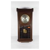 Pendulum wall clock with key, cannot make out