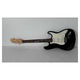 Electric guitar, has crack on back side, 39"