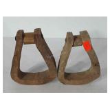 Two wooden stirrups