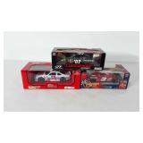 Three nascar stock cars in original boxes,