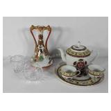 Asian decor vase, tea set with teapot, cups, and