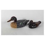 Two wooden duck decoys, 13" and 9" long