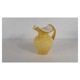 Unmarked Fenton amber crest cased glass pitcher,