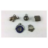 Five Sterling silver charms