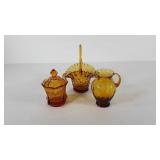 Amber glass group, basket made in Italy,  covered