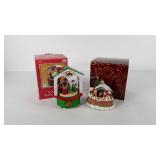 Two holiday music boxes, both work and have boxes