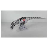Electronic dinosaur toy, battery operated, moves