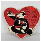Pepe Le Pew and Penelope metal heart sign age