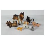Seven dog figurines, 2"-6"