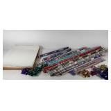 Christmas wrapping supplies, tissue paper, bows,