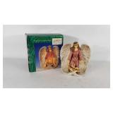 Porcelain guardian angel by Glorious Collection,