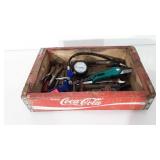 Wooden coca-cola crate full of tools, includes