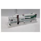 Hess gasoline toy truck and Space shuttle
