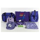 Group of purple bags, mostly Eastsport